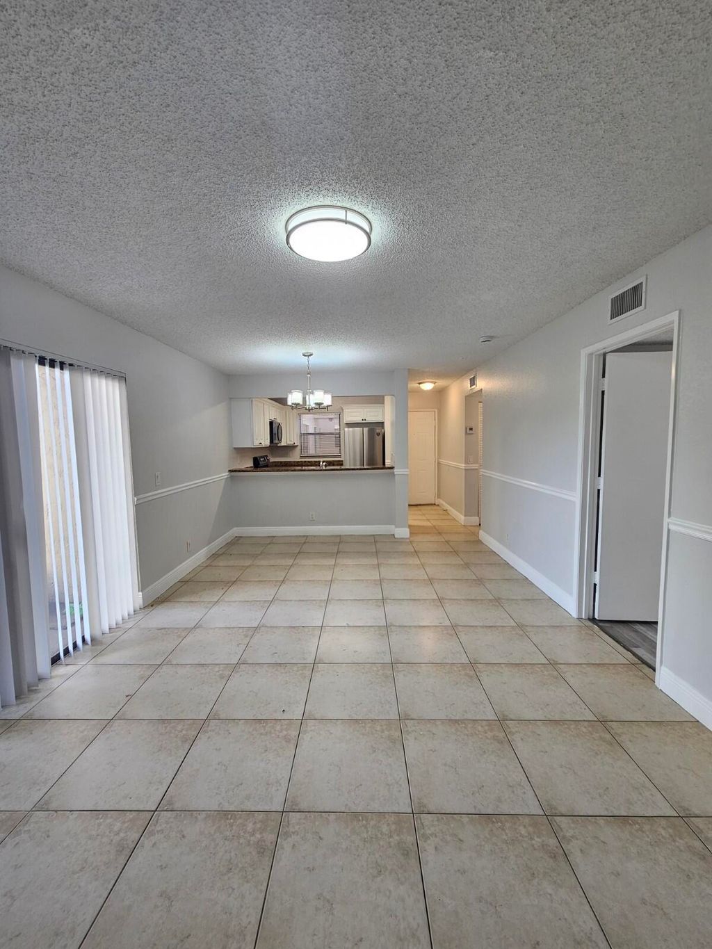 Photo of 1540 Windorah Way #A, West Palm Beach, FL 33411 (MLS # B26011140)