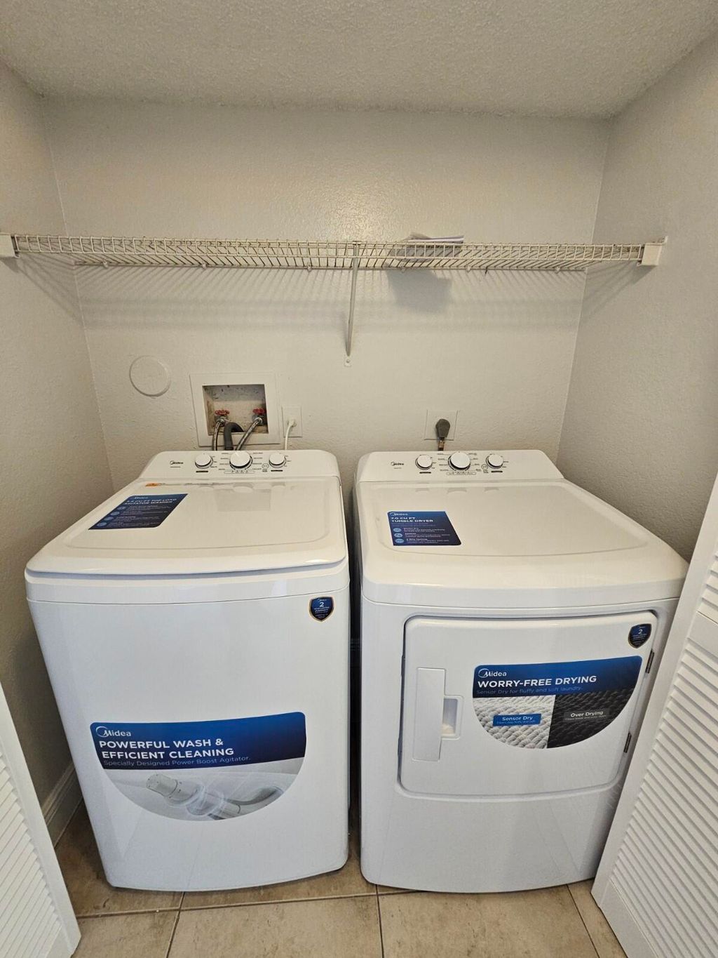 Photo of 1540 Windorah Way #A, West Palm Beach, FL 33411 (MLS # B26011140)