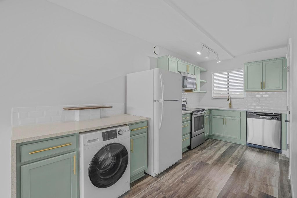 Photo of 1410 S Federal Highway #305, Lake Worth Beach, FL 33460 (MLS # F10499035)