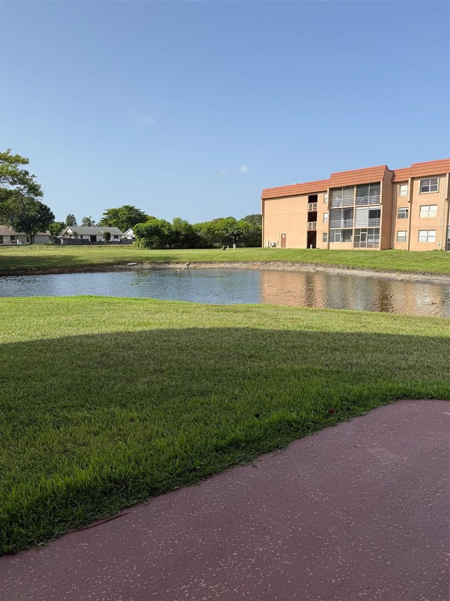 Charming Corner Garden-Style Condo Located on the first floor in the serene Sunrise Lakes 143 community, this light-filled 1?bed, 1?½ bath corner unit offers easy access and enhanced privacy. Featuring an enclosed Florida room overlooking tranquil canal and garden vistas, and open layout with a master suite and powder room. HOA covers abundant amenities—free golf, pools, fitness center, clubhouse, shuttle bus—and includes water, cable, outdoor maintenance and pest control. All in a pet-friendly 55+ environment near shopping and transit.