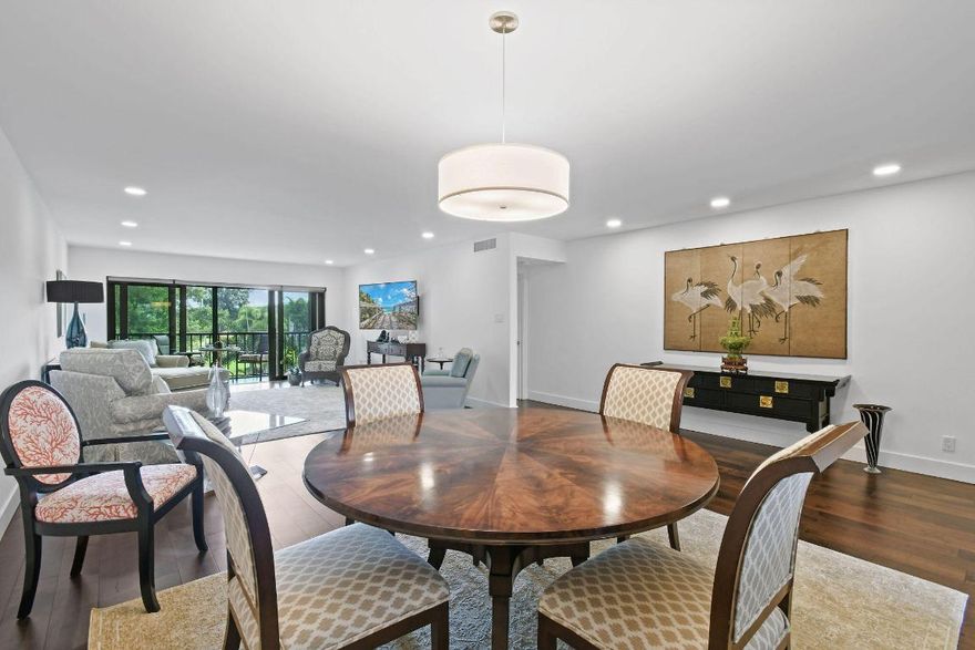 Temporarily off market for the Holidays.  Available on Jan 4, 2026. A rare opportunity awaits in Ocean Parks—this standout condominium sets a new standard for style and comfort in Jupiter, Florida. Masterfully remodeled 2-bedroom, 2-bath residence features a bright open floor plan with sophisticated contemporary finishes. The spacious, open-concept kitchen is appointed with rich cherry wood cabinetry, Bosch stainless steel appliances, and engineered quartz countertops.

Elegant T&G wood flooring flows throughout, complemented by recessed lighting and premium hurricane-rated PGT double paned impact windows and sliding doors. Enjoy effortless indoor/outdoor living from the screened and tiled balcony, perfect for soaking in coastal breezes and tranquil garden views. and a newer community center.  This prime location is situated near world-class beaches, Dubois Park, Carlin Park, waterfront restaurants, and the Maltz Theatre. This exceptional residence combines style, comfort, and an unbeatable location.