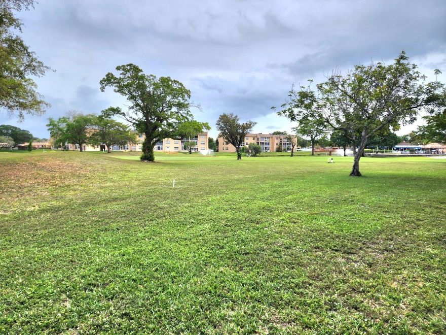 PRICE IMPROVEMENT--1st floor-2-bed, 2-bath unit in a well-maintained 55+ community. This quiet retreat has a golf course view and comes fully furnished (excluding personal items) with tile and carpet throughout. Enjoy resort-style amenities, including golf, heated pools, tennis, shuffleboard, a clubhouse, a theater, a gym, and more. Roll-down shutters on the patio.  No rentals allowed. Financing requires 20% down, cash 10%, income requirements for a 2/2, $3,000. All buyers must be 55+, with a 6-month escrow maintenance deposit held for two years. Seller will pay roof assessment in full prior/at closing. See MLS for attachments. Unit is sold "AS IS" with right to inspection.