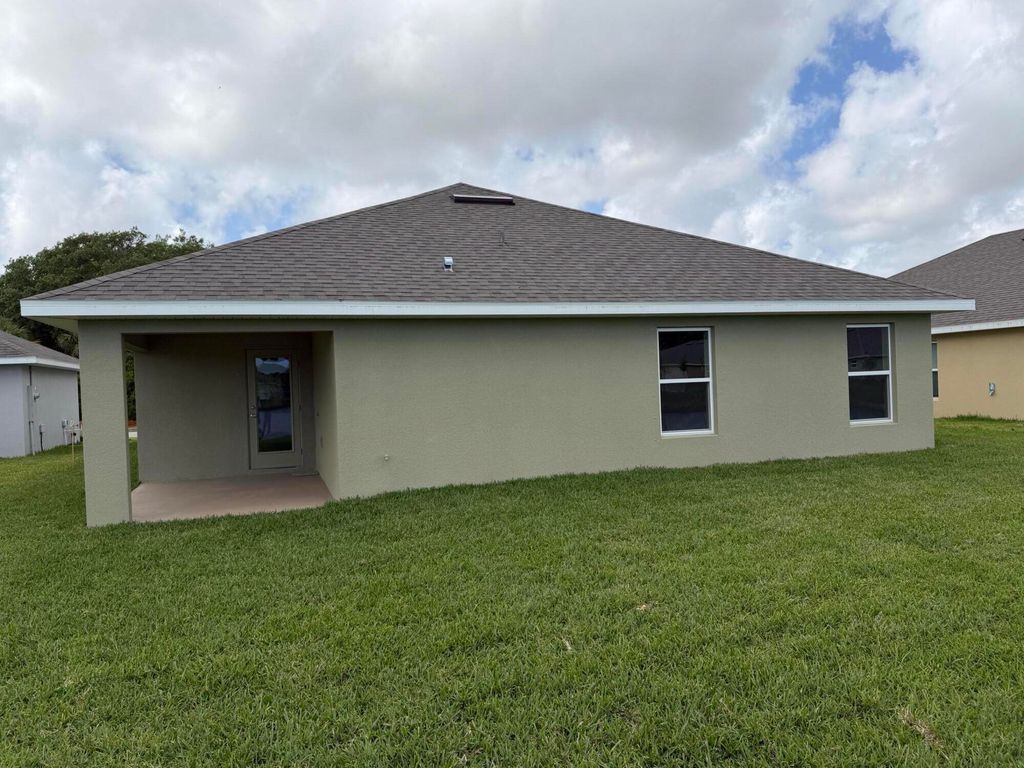 Photo of 5736 Waterstone Boulevard, Fort Pierce, FL 34951 (MLS # B26002378)