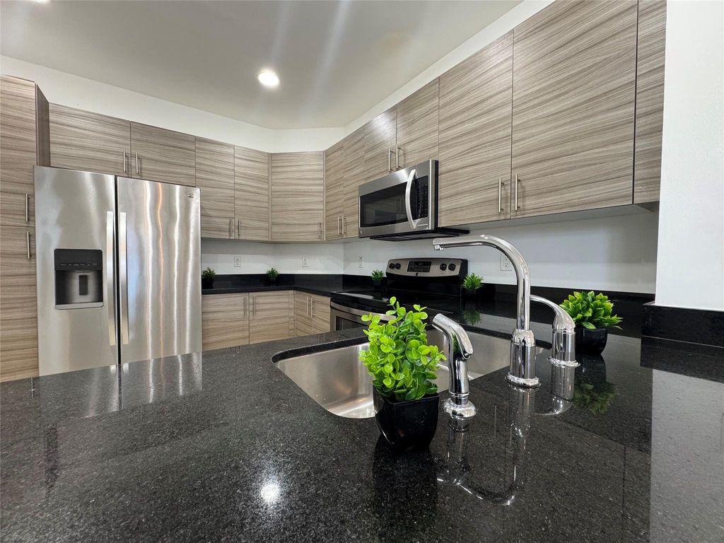 Photo of 2675 SW 81st Terrace #2683, Miramar, FL 33025 (MLS # B26029810)