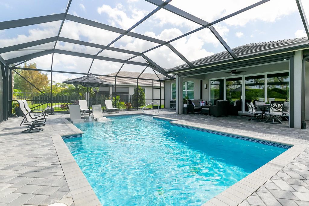 Photo of 11409 SW Half Moon Lake Lane, Port Saint Lucie, FL 34987 (MLS # R11078967)