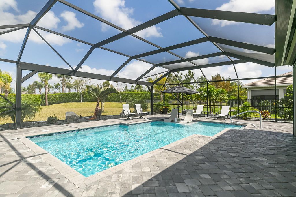 Photo of 11409 SW Half Moon Lake Lane, Port Saint Lucie, FL 34987 (MLS # R11078967)