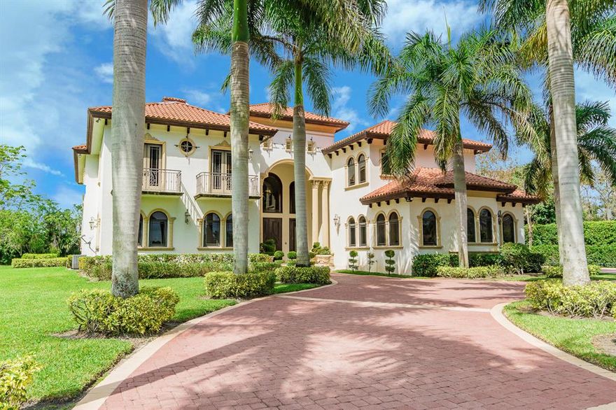 This is an amazing one of a kind   Estate home on two lots with a second home, hacking distance to the horse show. Unbelievable luxury living like the Breakers hotel!!!  Master bedroom is phenomenal,  Each bed room is a suite with its own bath, Hand carved wooden doors, custom wrought iron railings, beautiful wood flooring,impact glass, newer AC units, stunning gourmet kitchen, plus an outside kitchen and bar area,, generator, huge back yard , lovely balcony's, wet sauna , gas fireplace, completely wire for a smart home, security cameras,wine storage, located  on a cul-de-sac , with a barn and room to extend  this list of extras and upgrades goes on and on.  List available by request. Do not miss this opportunity , it wont last long !! You will not be disappointed