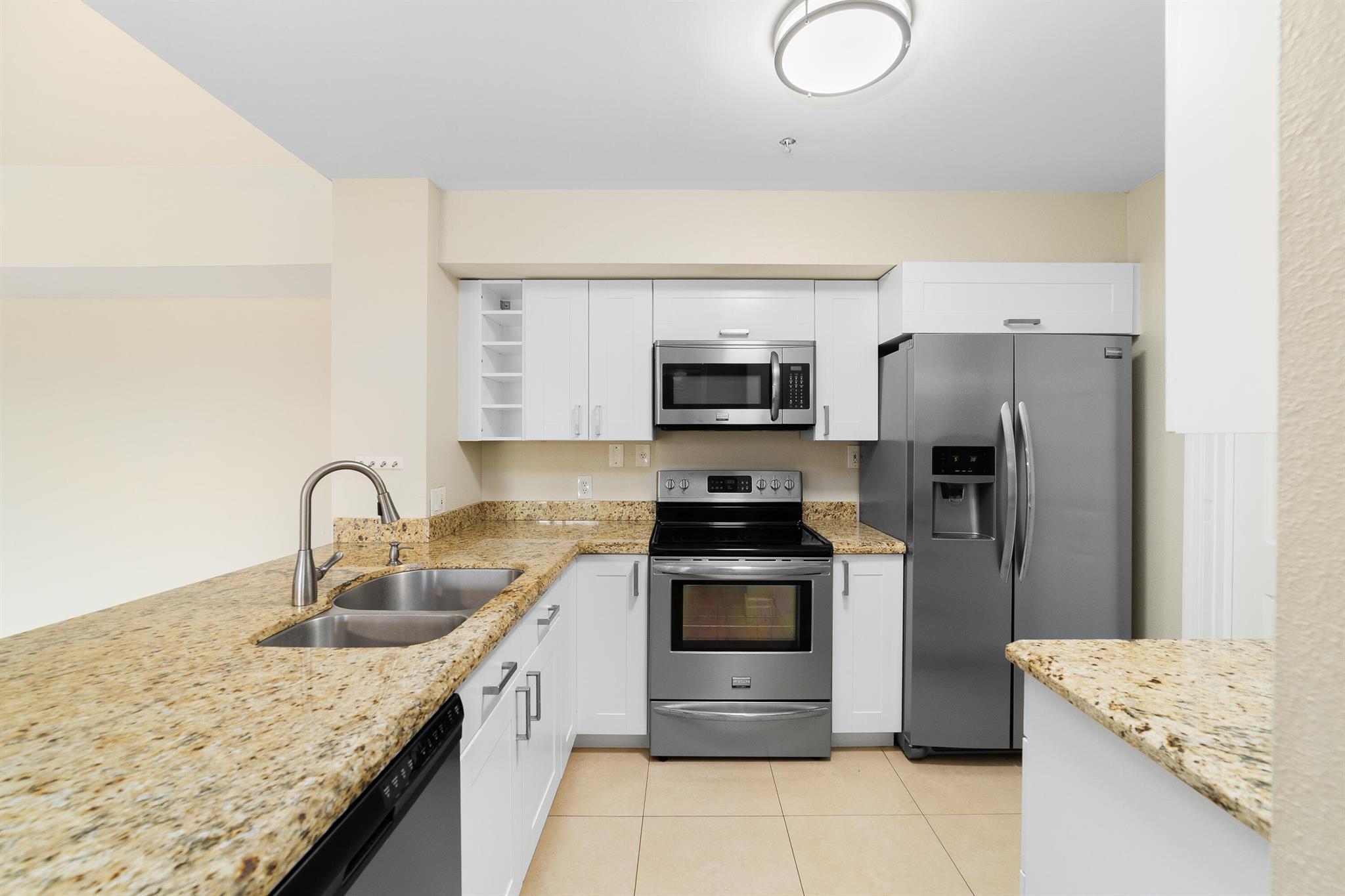 ***Call All Investors*** Tenant Occupied until August 2026. Welcome to this stunning condo in the highly sought-after St. Andrews at Boynton Beach! This spacious 3-bedroom, 2-bathroom unit offers 1,276 sq. ft. of living space, with two primary suites for ultimate comfort. Recently remodeled in 2019, the home features a modern design, including built-in shelves, cathedral/vaulted ceilings, and an abundance of natural light. Enjoy peace of mind with brand new impact windows and sliders (2024), a new water heater (2024), and a new air conditioning unit (2023). The community offers fantastic amenities, including a clubhouse, picnic area, a pool--perfect for relaxing and socializing, water, sewer, and trash pick up. Don't miss out on this incredible opportunity!