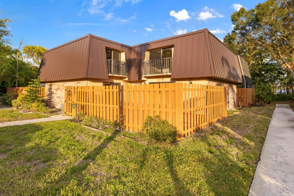 Photo of 5891 SE Windsong Lane #828, Stuart, FL 34997 (MLS # R11047017)