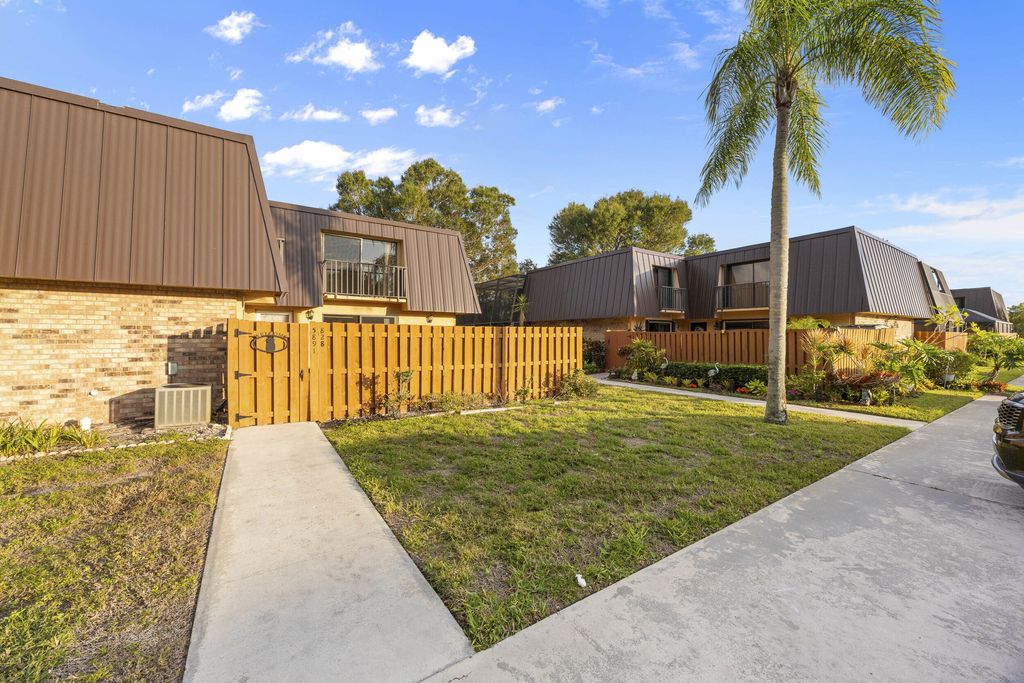 Photo of 5891 SE Windsong Lane #828, Stuart, FL 34997 (MLS # R11047017)