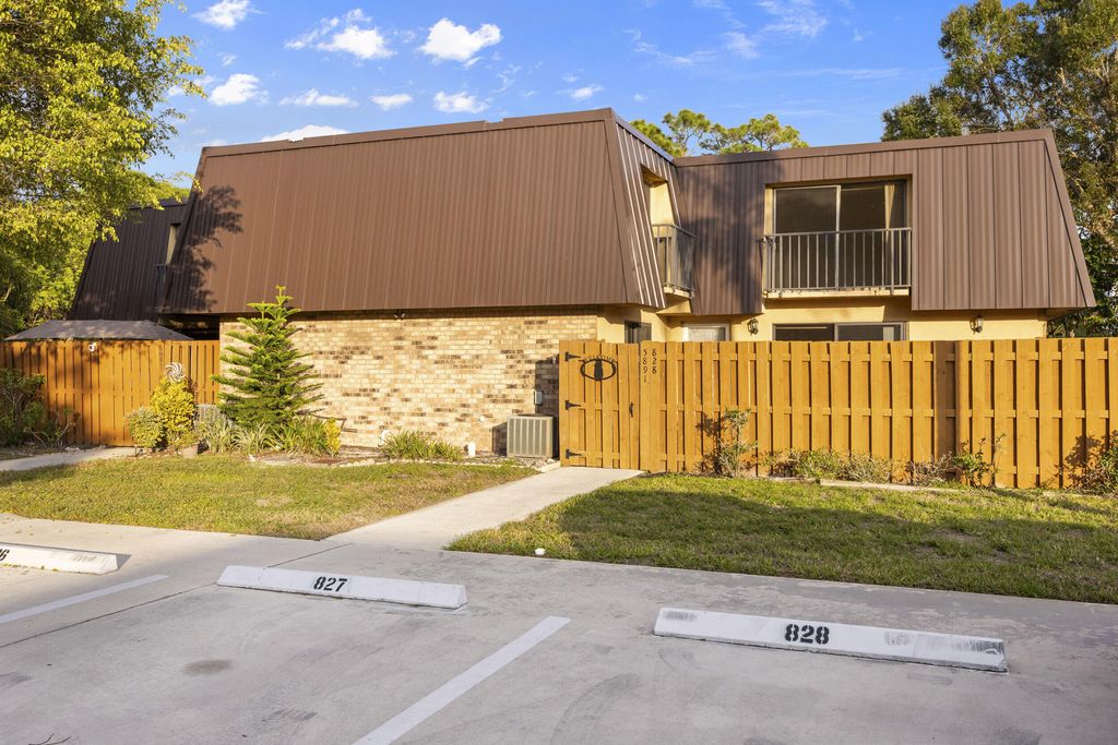 Photo of 5891 SE Windsong Lane #828, Stuart, FL 34997 (MLS # R11047017)