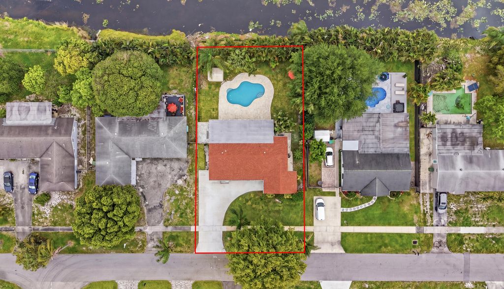 Photo of 316 Riverdale Road, Palm Springs, FL 33461 (MLS # B26016733)