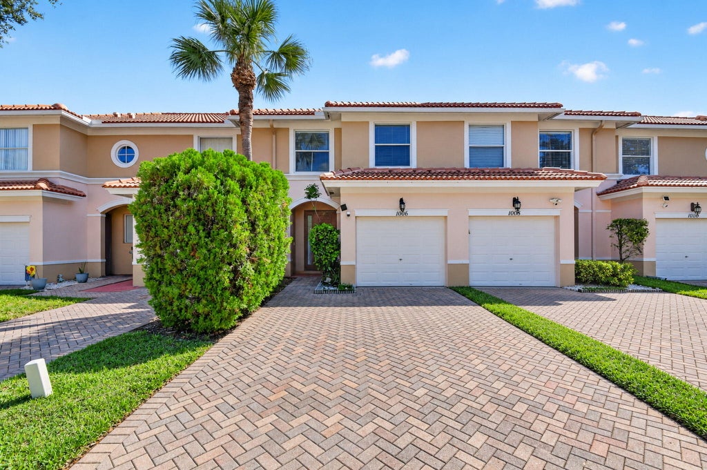 Photo of 1006 Seminole Palms Drive, Greenacres, FL 33463 (MLS # B26091000)