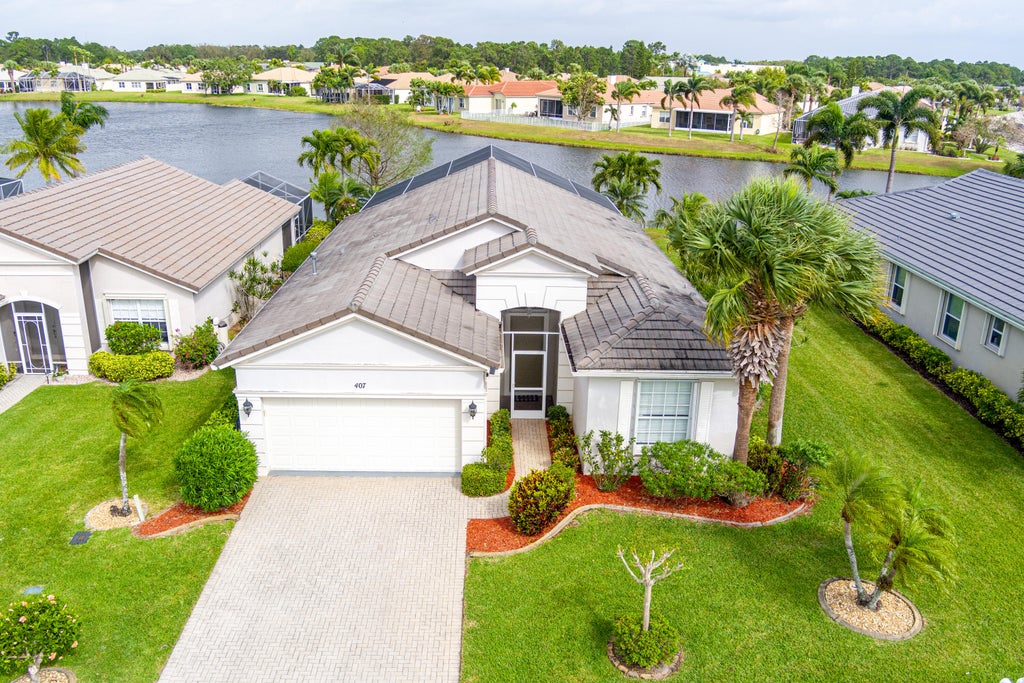 Photo of 407 SW Talquin Lane, Port Saint Lucie, FL 34986 (MLS # R11068609)