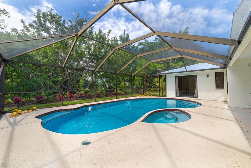 Improved price! Fall in Love with this beautiful East Port St. Lucie Pool Home - only 15 minutes to Jensen Beach!
This beautifully updated and fully turnkey 4-bedroom (3 + bonus room), 2-bath pool home features a DEN, 2-car garage, and a flexible layout—perfectly located in desirable East Port St. Lucie with no HOA!

Highlights include:
 • NEW Roof (2023)
 • NEW Pool Screen & Pump
 • NEW Gutters
 • NEW Luxury Vinyl Plank Flooring
 • Fresh Interior & Exterior Paint
 • NEW Appliances + Grill
 • Cozy Fireplace
 • NEW Dimmable Chandeliers & Kitchen Lighting
 • NEW Smart Thermostat
 • Beautiful Upgraded Shed
 • Freshly Painted Garage