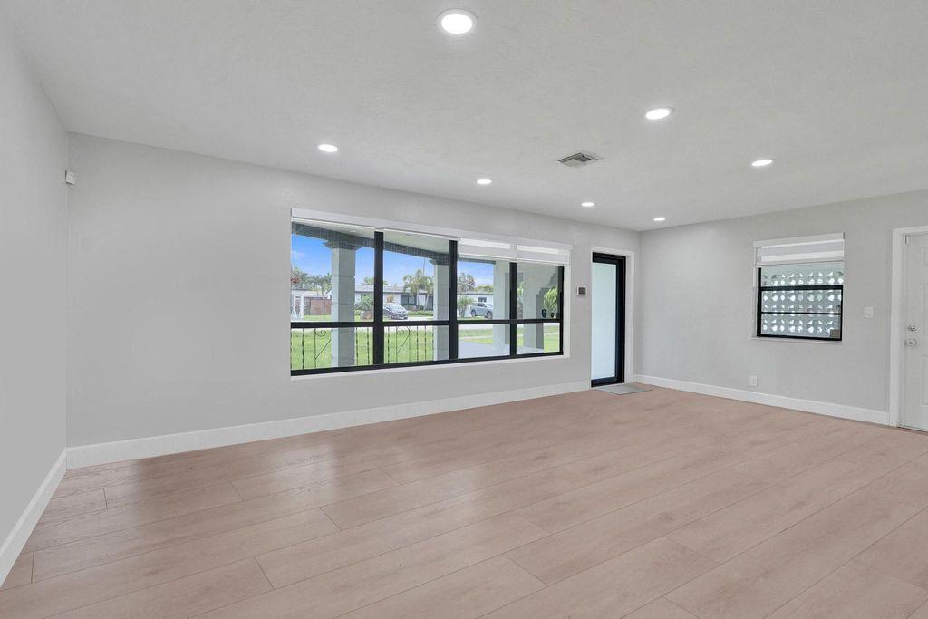 Photo of 1054 Wyoming Avenue, Fort Lauderdale, FL 33312 (MLS # B26042385)
