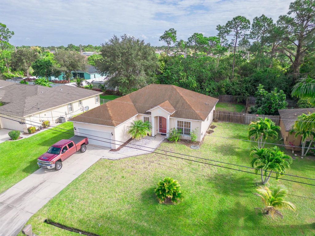 Photo of 3537 SW Foremost Drive, Port Saint Lucie, FL 34953 (MLS # R10945023)