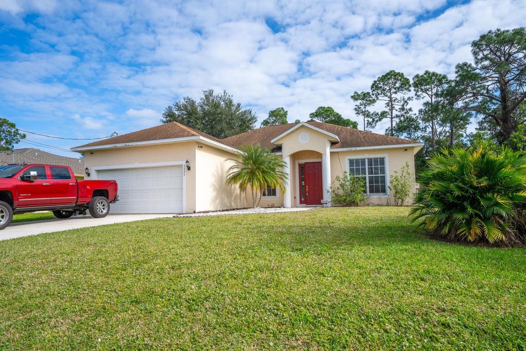 Photo of 3537 SW Foremost Drive, Port Saint Lucie, FL 34953 (MLS # R10945023)