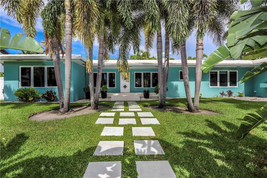 MOTIVATED SELLER! STUNNING Mid-Century Modern home in Ft. Lauderdale off Las Olas. The moment you step into this home you will be awed by the curved floor to ceiling windows which overlook the sleek 48'x16' pool and spa. Large white stone patio, artificial turf and Foxtail Palm trees complete your backyard resort. The property is 120' deep by 110' wide, two lots from the point on an extra wide and deep canal that will accommodate your 90' yacht. Original terrazzo floors throughout, original plaster crown molding, oversized bedrooms with full baths and Euro Tech hurricane windows and doors make this home extra special. The updated kitchen includes a Bosch dishwasher, induction cooktop, double oven, refrigerator and trash compactor. A BEAUTIFUL MID-CENTURY MODERN HOME with a WOW factor.