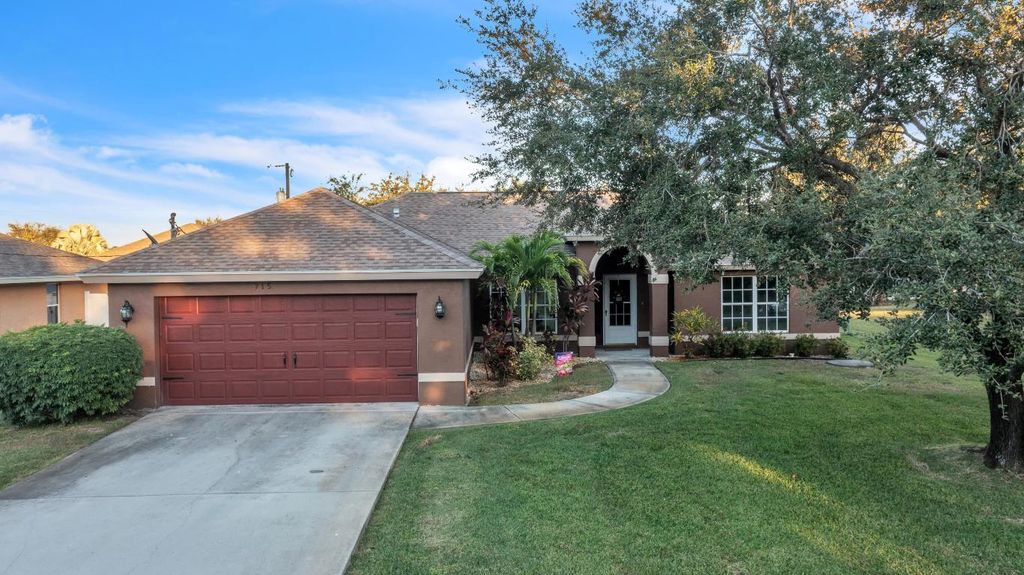 Photo of 715 NW Rainbow Street, Port Saint Lucie, FL 34983 (MLS # R11139384)