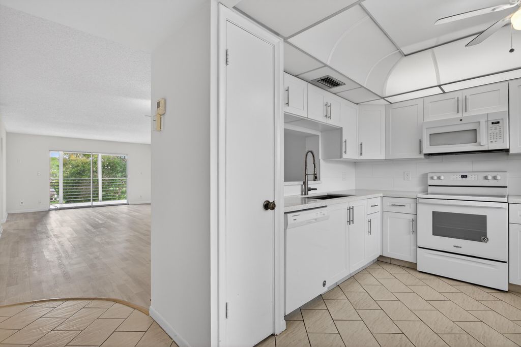 Photo of 3306 Aruba Way #E3, Coconut Creek, FL 33066 (MLS # B26011375)