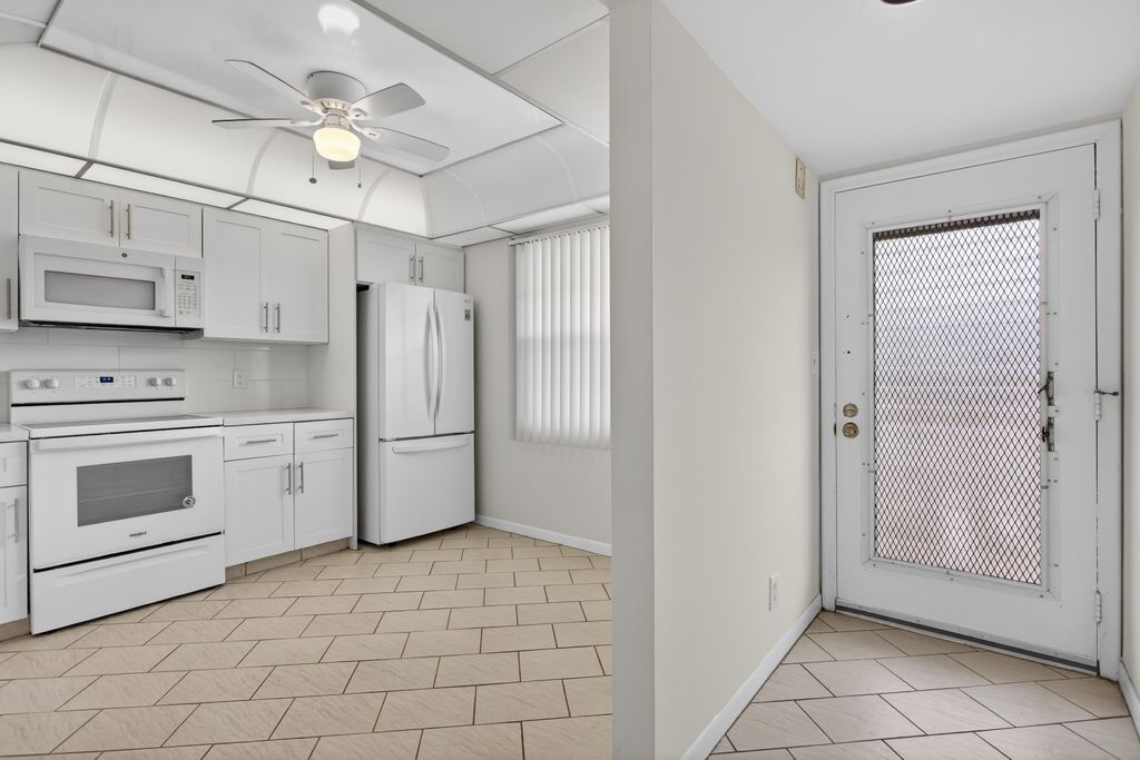 Photo of 3306 Aruba Way #E3, Coconut Creek, FL 33066 (MLS # B26011375)