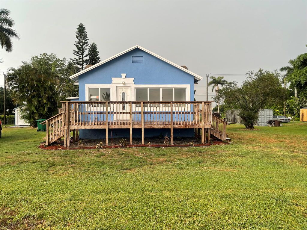 Photo of 242 NW 3rd Avenue, South Bay, FL 33493 (MLS # R11000544)