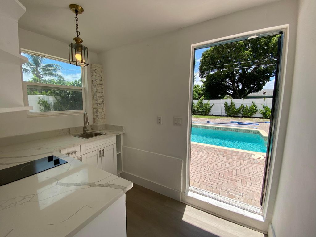 Photo of 330 Cypress Drive #C, Lake Park, FL 33403 (MLS # R11017614)