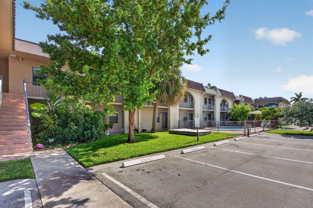 Photo of 2141 NE 42nd Street #112, Lighthouse Point, FL 33064 (MLS # B26045781)