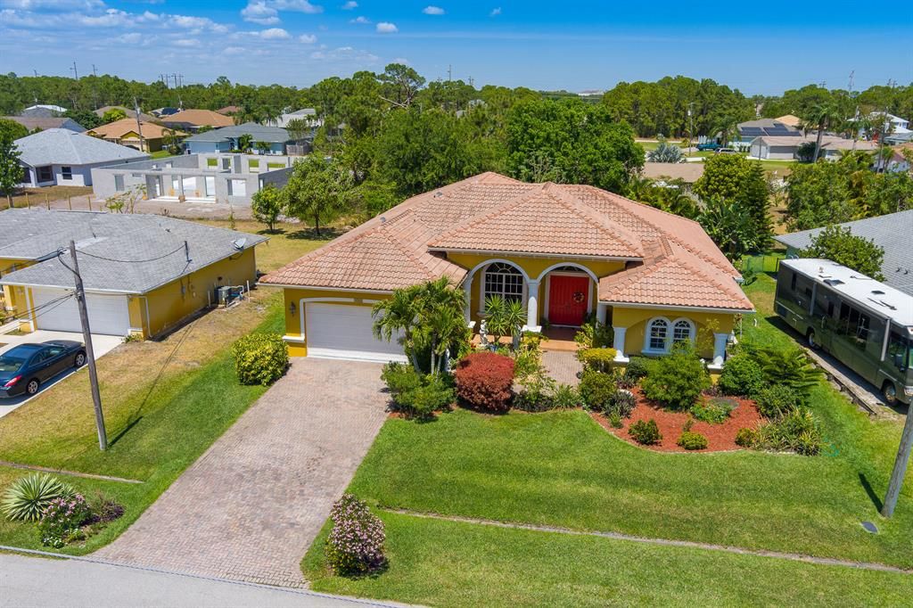 Photo of 5761 NW Esau Avenue, Port Saint Lucie, FL 34986 (MLS # R10706612)