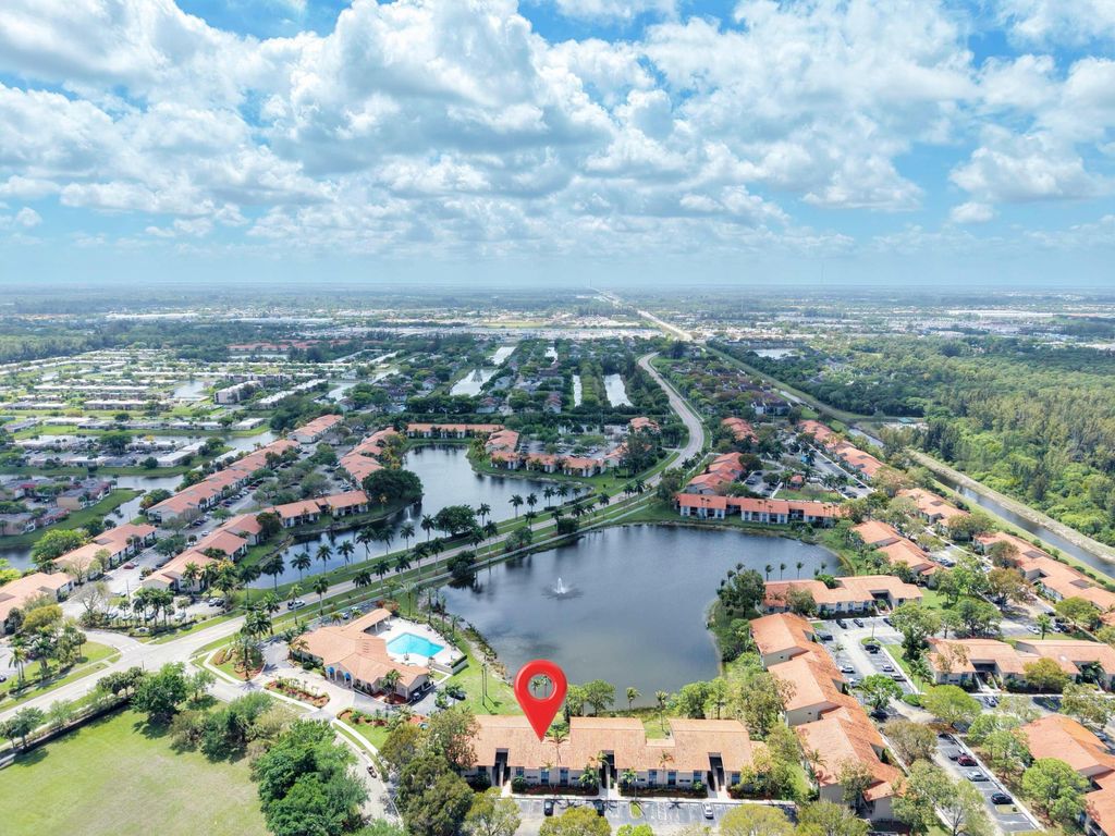 Photo of 1760 Windorah Way #D, West Palm Beach, FL 33411 (MLS # B26012579)