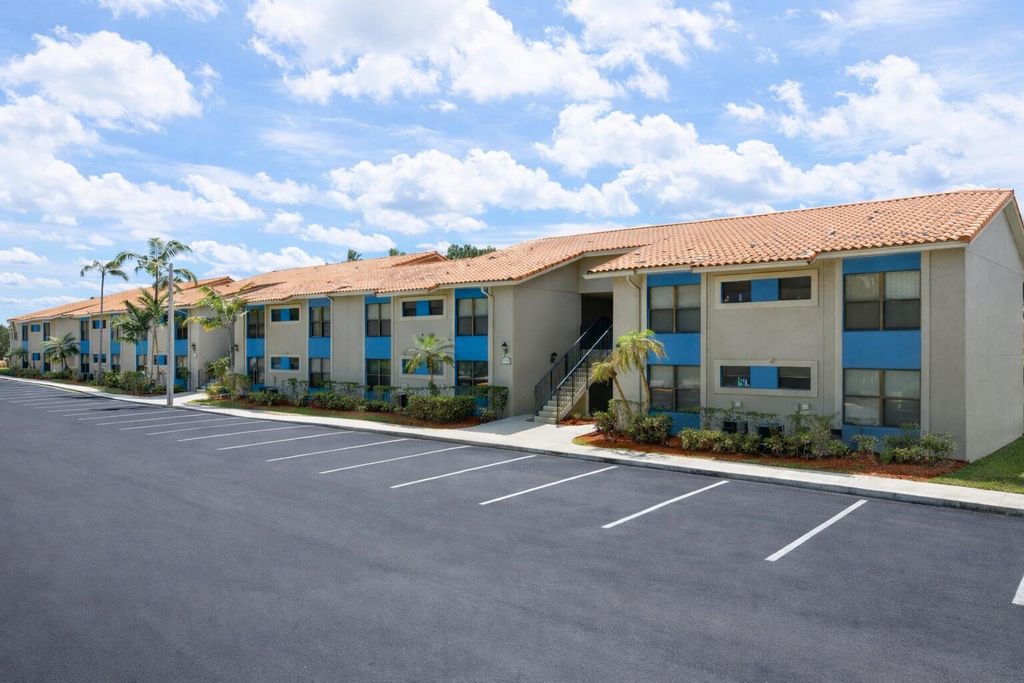 Photo of 1760 Windorah Way #D, West Palm Beach, FL 33411 (MLS # B26012579)