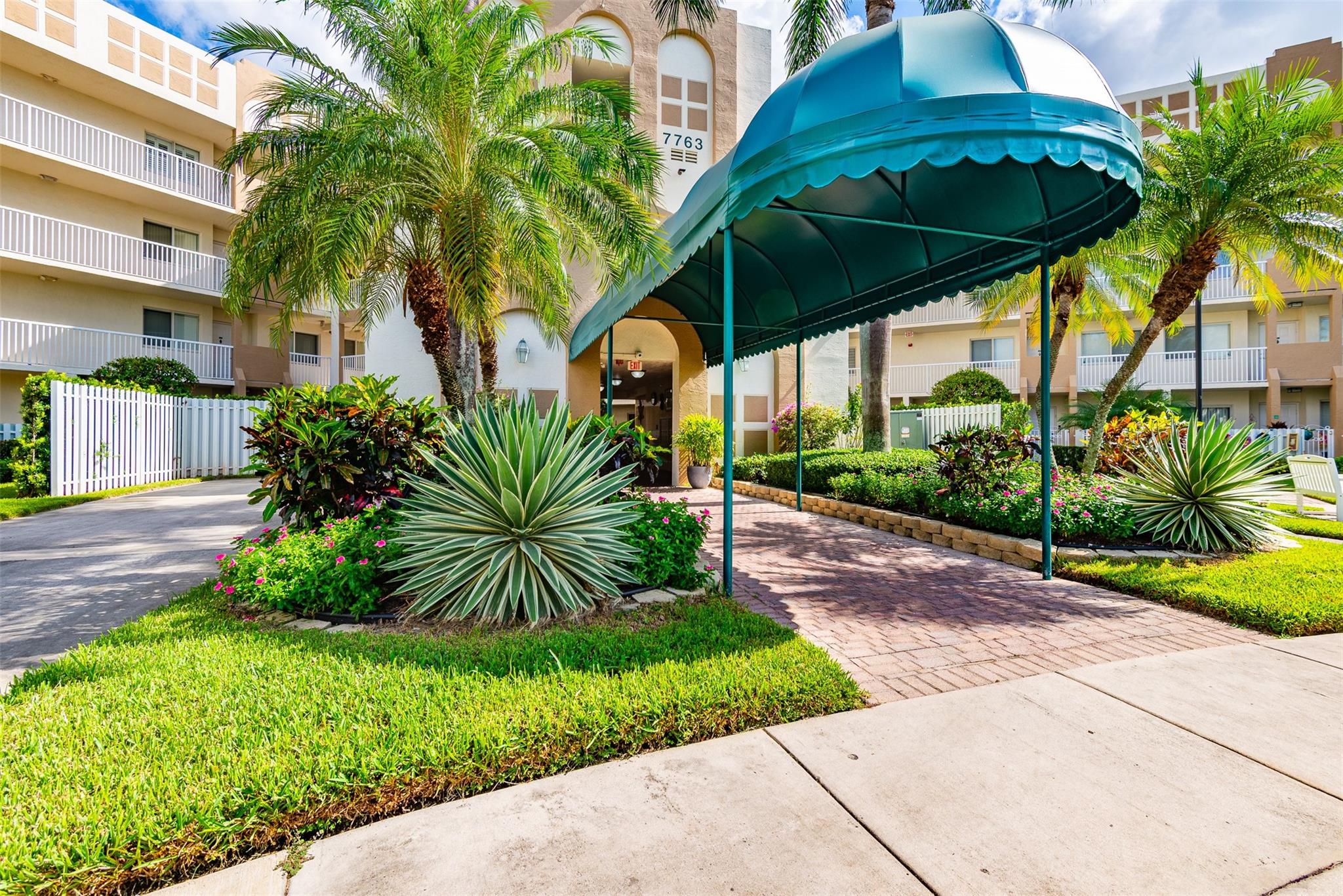 Come and see this lovely spacious 55+ condo in the heart of Tamarac! This corner unit features a upgraded kitchen with newer cabinets and granite countertops. Large primary bedroom with larger walk in closet. Extremely clean unit with lots of storage space with screened in patio facing the lake. Excellent guard gated community with lots of amenities. Great location! Minutes from Sawgrass expressway. Easy to show