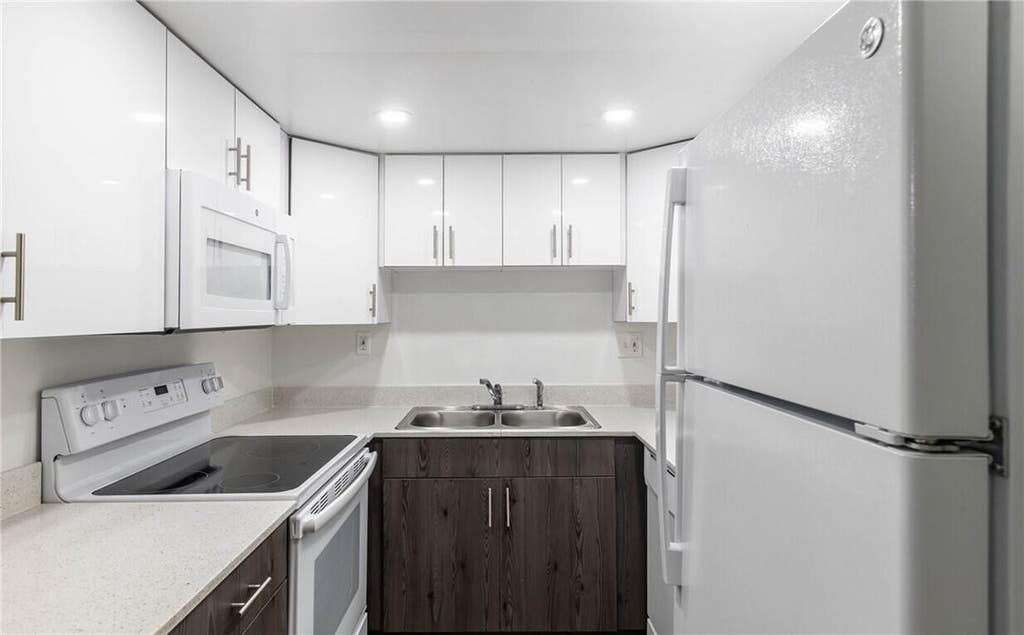 Photo of 401 NW 34 Street #87-101, Pompano Beach, FL 33064 (MLS # B26059733)