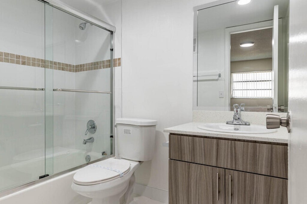 Photo of 401 NW 34 Street #87-101, Pompano Beach, FL 33064 (MLS # B26059733)