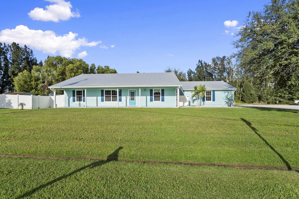 Photo of 6649 NW Omega Road, Port Saint Lucie, FL 34983 (MLS # R11135734)