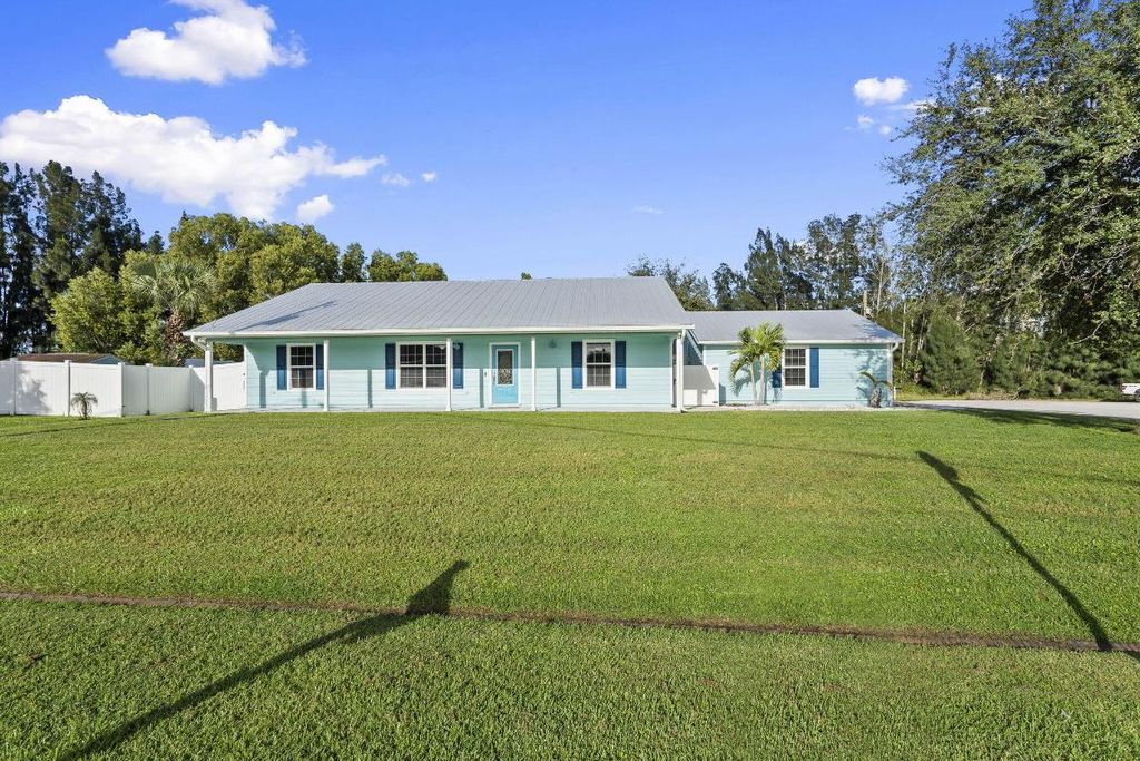 Photo of 6649 NW Omega Road, Port Saint Lucie, FL 34983 (MLS # R11135734)