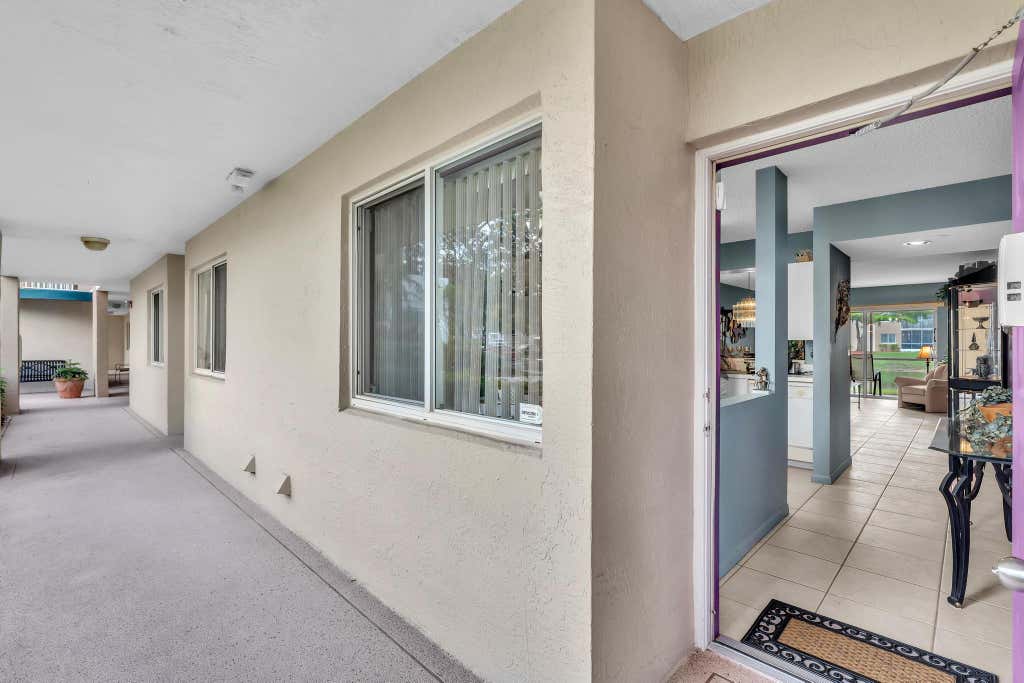 Photo of 9560 WELDON Circle #J110, Tamarac, FL 33321 (MLS # B26058290)