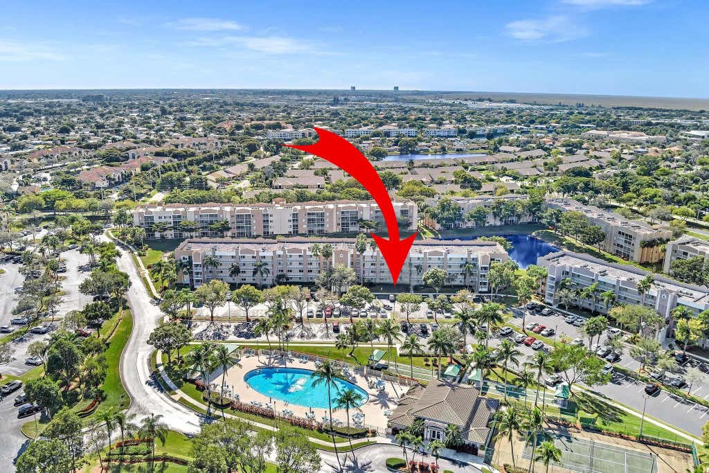 Photo of 9560 WELDON Circle #J110, Tamarac, FL 33321 (MLS # B26058290)