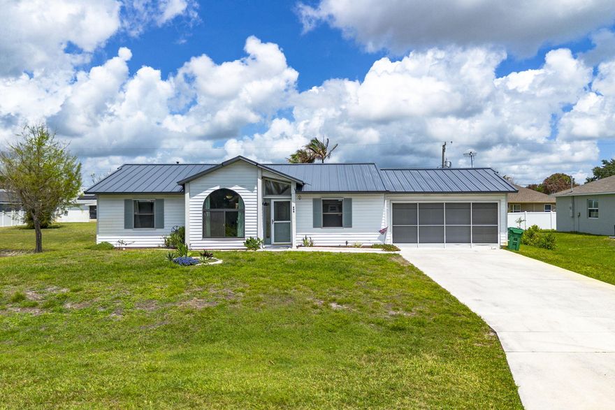 Cozy 3BR/2BA pool home with a fully updated kitchen and peaceful side water view. Enjoy outdoor living by the private pool. Major upgrades include a 2026 metal roof, 2022 AC, new washer & dryer, irrigation system, water filtration system negotiable, and new gutters and shed. Move-in ready with comfort and convenience throughout.