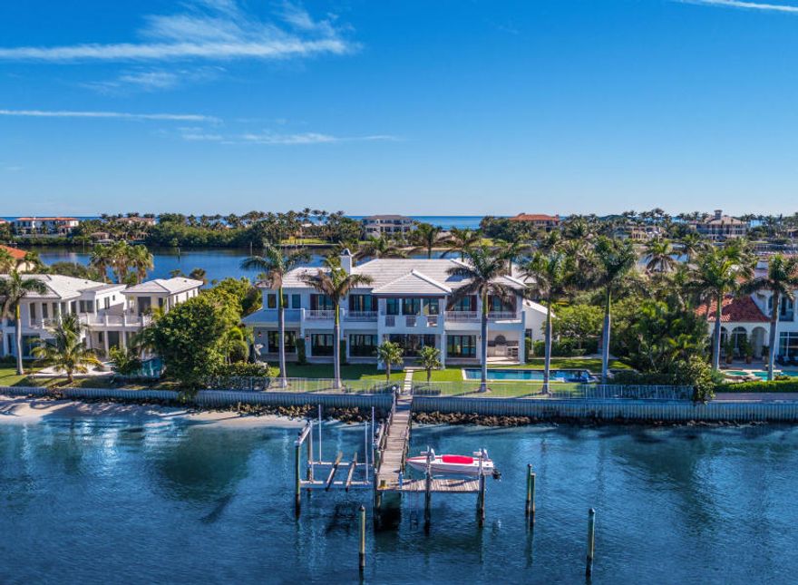 Casually elegant living is at home in the relaxing realm of this contemporary island-inspired estate looking out on the gorgeous wide Intracoastal waters. A stately 2-story reception room brings guests into the expansive waterside great room with chef's kitchen, leading to the entertainment verandah by the pool. Another romantic waterside verandah spans the grand but gracious master suite. The boat dock has 2 lifts. The information herein is deemed reliable and subject to errors, omissions or changes without notice.  The information has been derived from architectural plans or county records. Buyer should verify all measurements. DISCLAIMER: The written and verbal information provided including but not limited to prices, measurements, square footages, lot sizes, calculations and statistics have been obtained and conveyed from third parties such as the applicable Multiple Listing Service, public records as well as other sources. All information including that produced by the Sellers or Listing Company are subject to errors, omissions or changes without notice and should be independently verified by any prospect for the purchase of a Property.  The Sellers and Listing Company expressly disclaim any warranty or representation regarding all information.  Prospective purchasers' use of this or any written and verbal information is acknowledgement of this disclaimer and that Prospects shall perform their own due diligence.  Prospective purchasers shall not rely on any written or verbal information provided when entering a contract for sale and purchase.  Some affiliations may not be applicable to certain geographic areas. If your property is currently listed with another agent, please do not consider this a solicitation for the listing. In the event a Buyer defaults, no commission will be paid to either Broker on the Deposits retained by the Seller.  "No Commissions Paid until Title Passes."  Copyright 2019 Listing Company. All Rights Reserved.