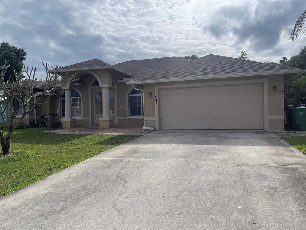 Photo of 1072 SW Castaneda Lane, Port Saint Lucie, FL 34953 (MLS # R11051552)