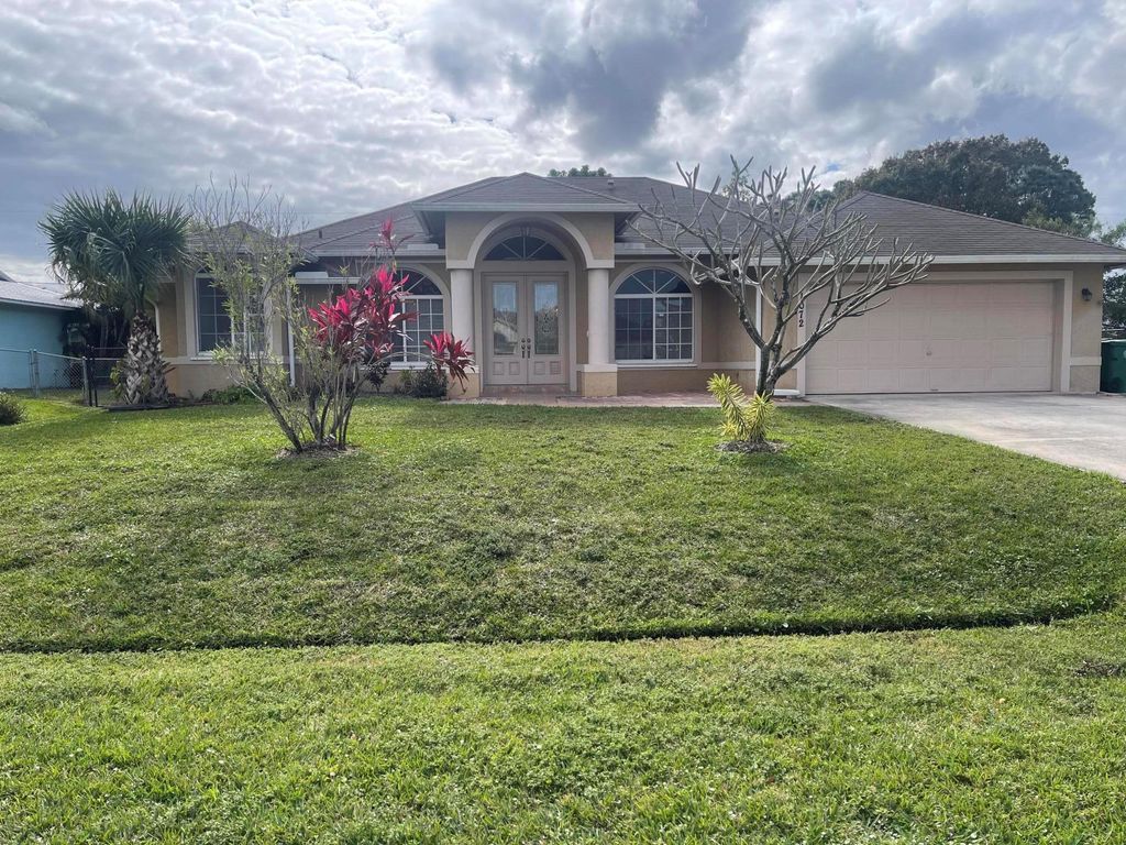 Photo of 1072 SW Castaneda Lane, Port Saint Lucie, FL 34953 (MLS # R11051552)