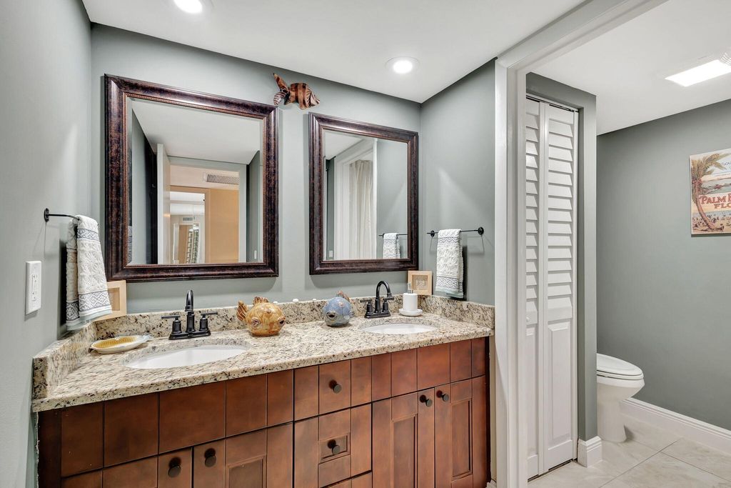 Photo of 99 Lake Arbor Drive, Palm Springs, FL 33461 (MLS # B26047853)