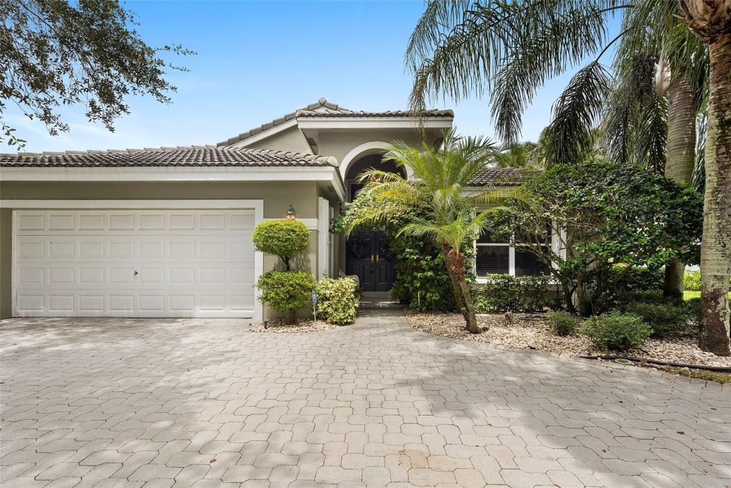 Photo of 5704 NW 46th Drive, Coral Springs, FL 33067 (MLS # F10451180)