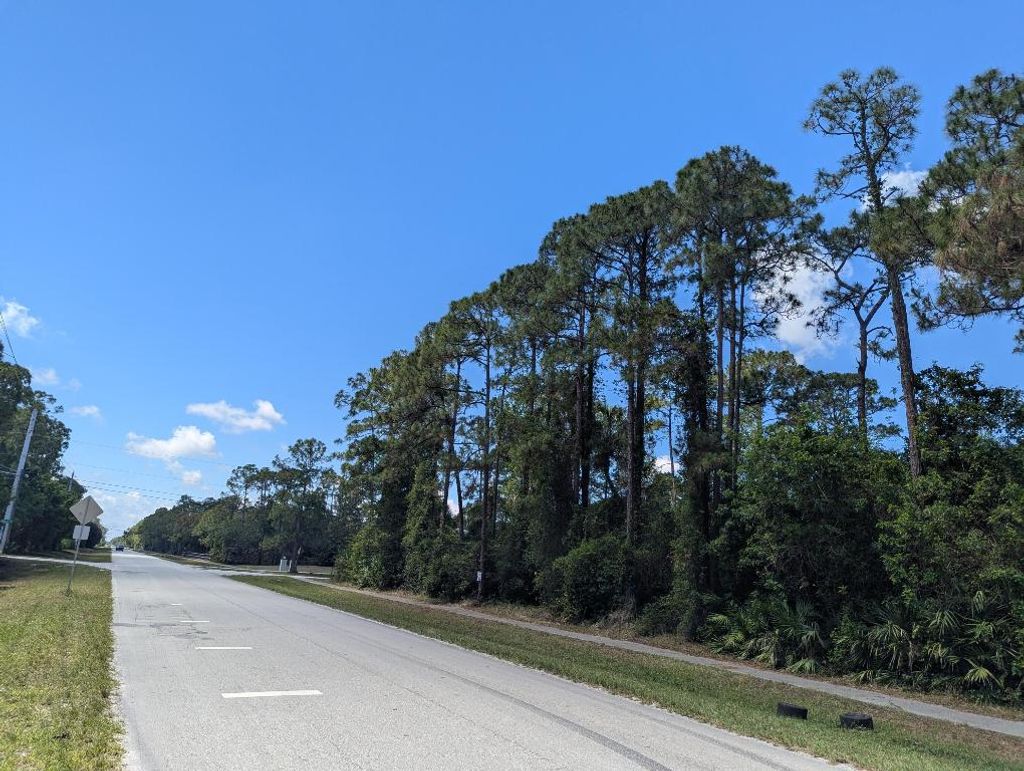 Photo of 237 Mandarin Boulevard, Loxahatchee, FL 33470 (MLS # R11090780)