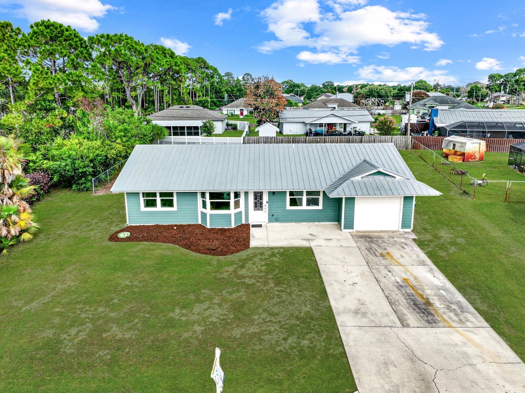 Photo of 2291 SW Franklin Street, Port Saint Lucie, FL 34953 (MLS # B26036101)