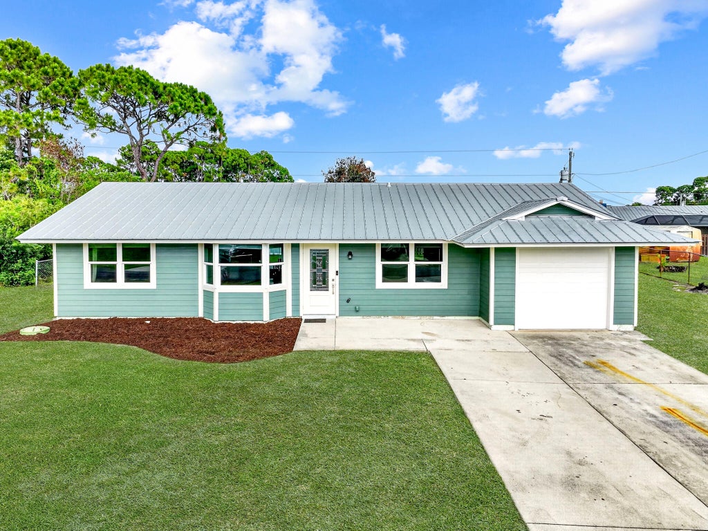 Photo of 2291 SW Franklin Street, Port Saint Lucie, FL 34953 (MLS # B26036101)