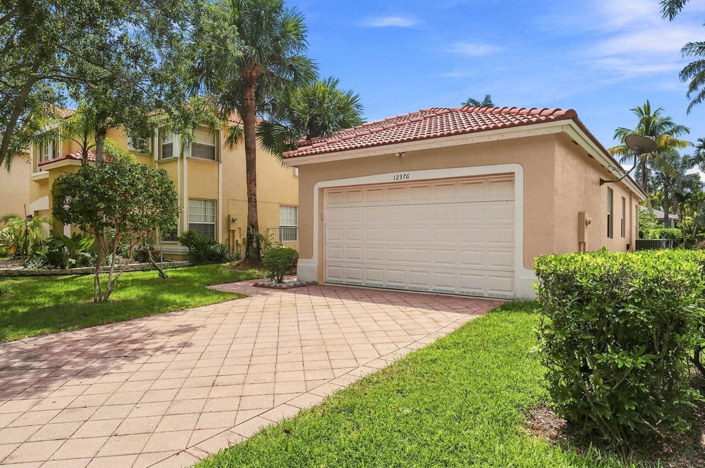 Photo of 12376 NW 53RD Street, Coral Springs, FL 33076 (MLS # B26068661)