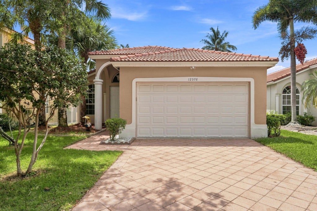 Photo of 12376 NW 53RD Street, Coral Springs, FL 33076 (MLS # B26068661)